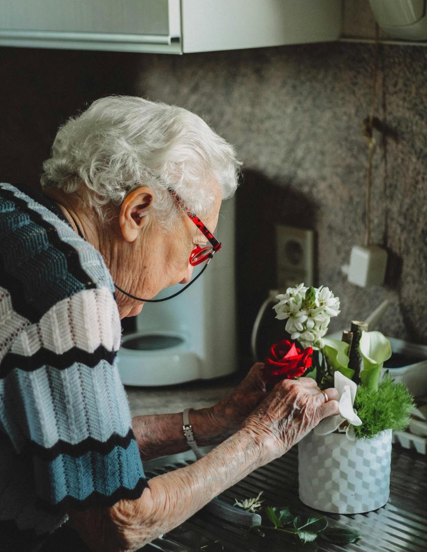 woman-tending-to-flowers