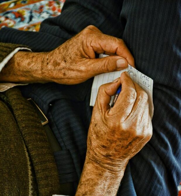old-man-holding-paper