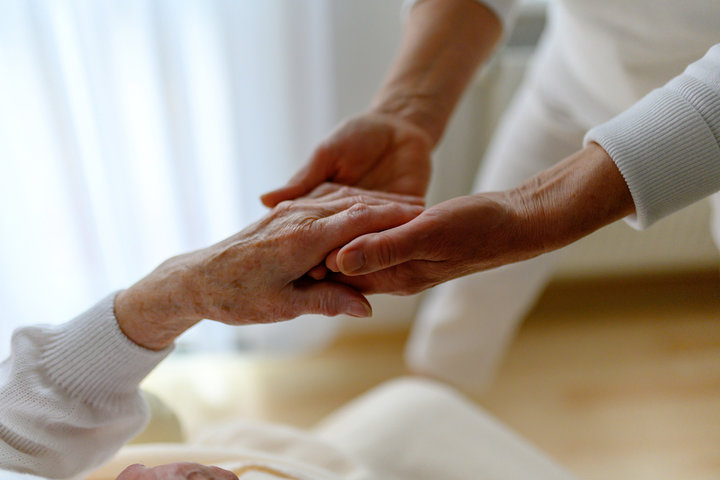carer and residents hands