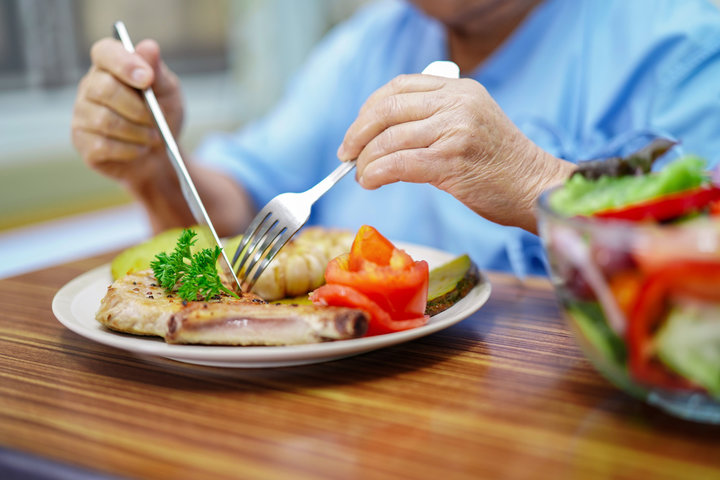 old person eating